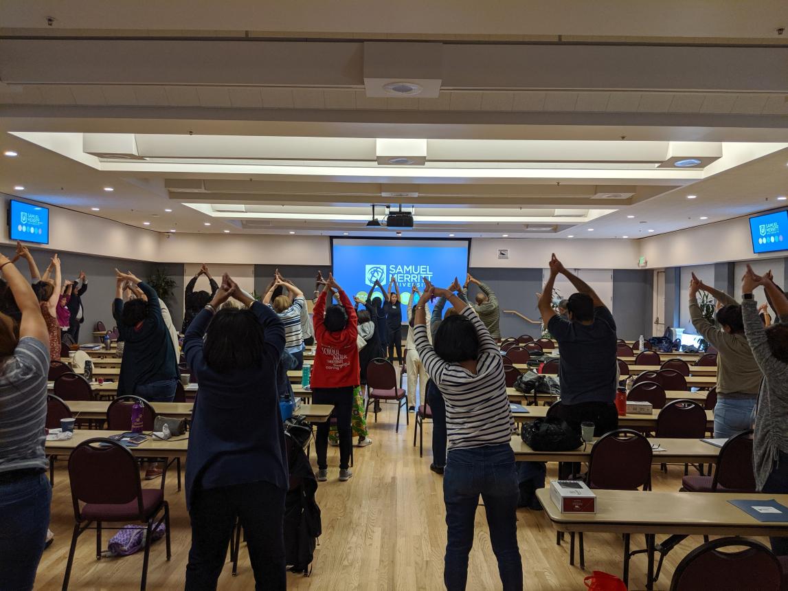 Participants practice Yoga poses