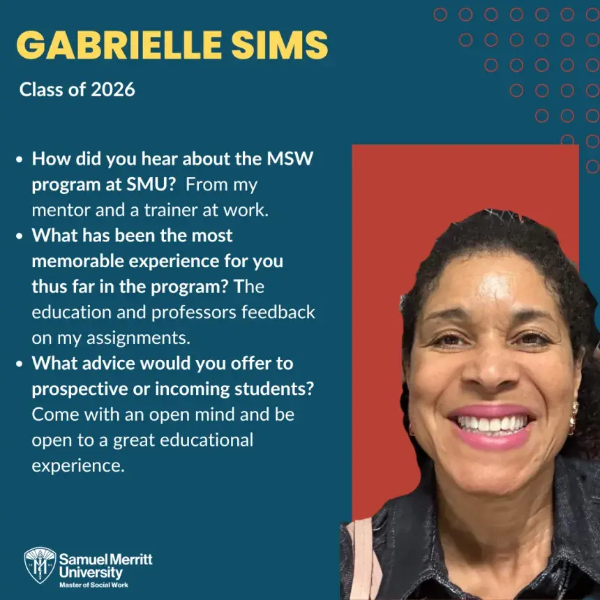 Woman with dark hair smiling and looking forward