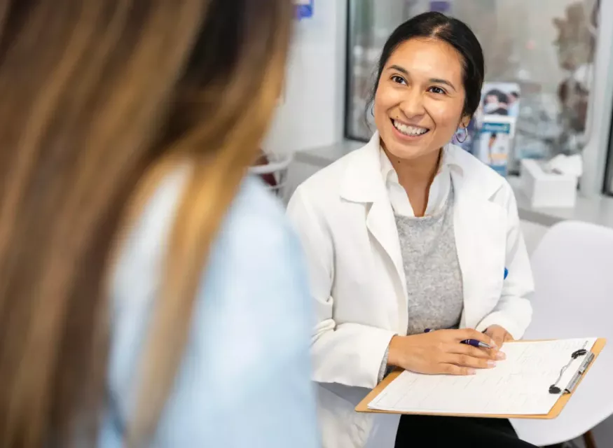 Family Nurse Practitioner consulting with patient