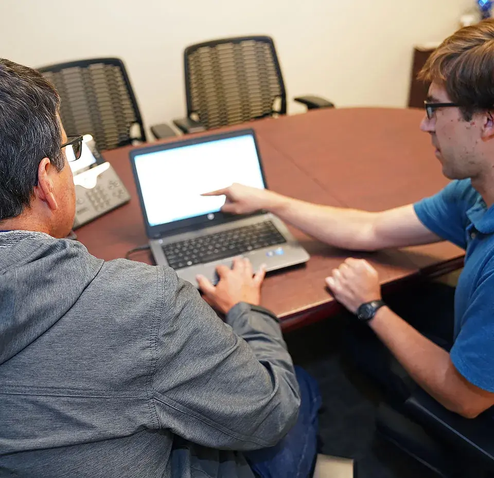 Staff using technology