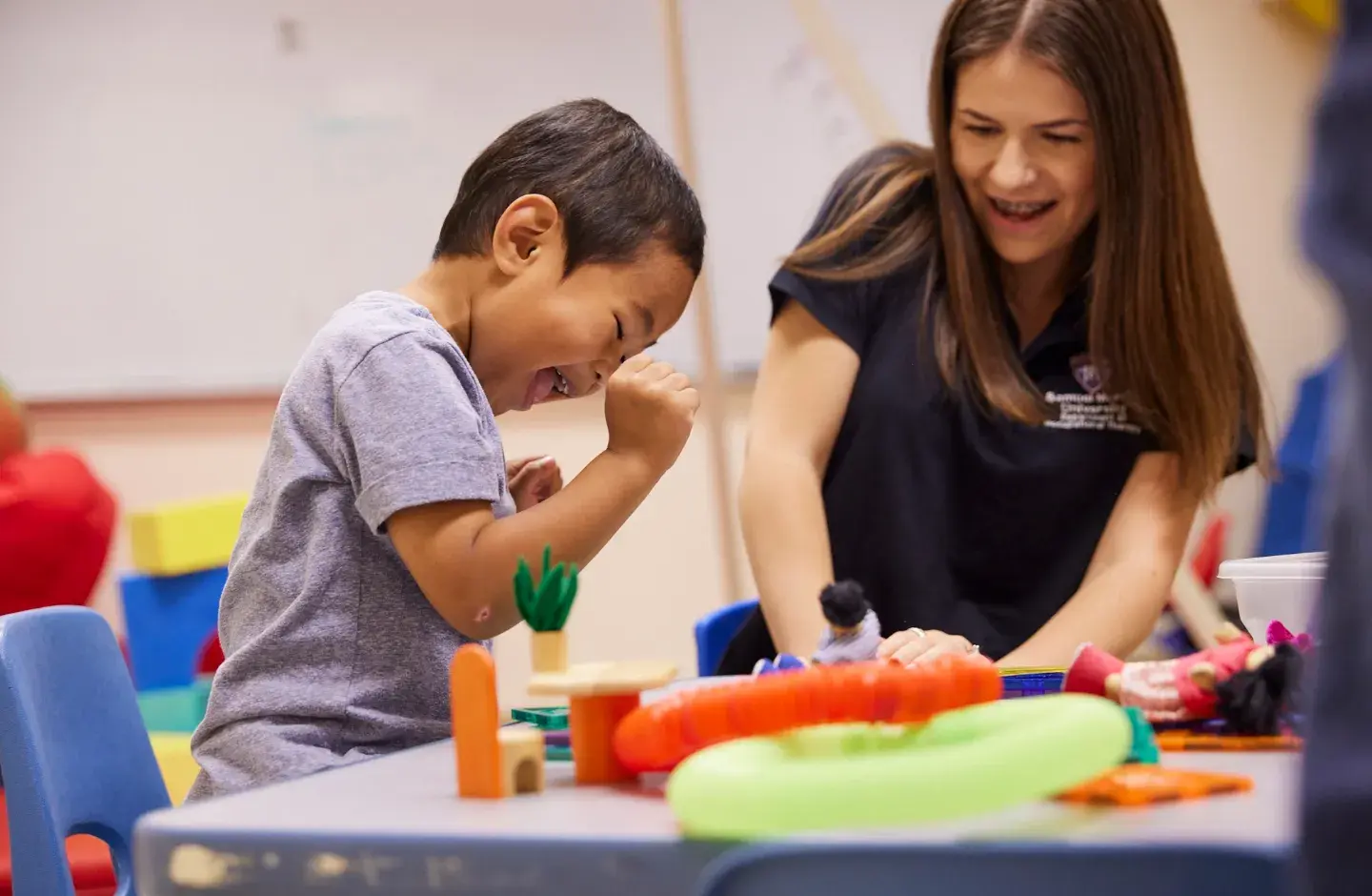 Occupational therapist working with child