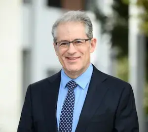 Man in suit standing outside