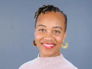 Woman in pink sweater