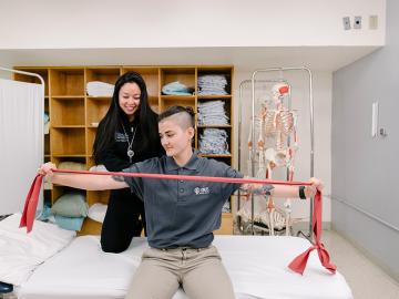 Physical Therapist with patient
