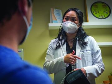 Victoria Bunarjo, ELMSN-FNP '21, sees a patient at Marina Village Medical in Alameda, CA.