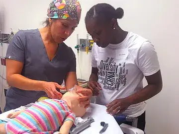 Ana Armenta, CRNA '16 (left)