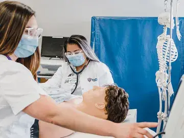 BSN students in the HSSC simulation lab