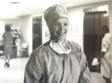 Rondi Crowley wearing scrubs in hospital