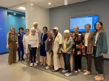 a group of providence alumnae at the new smu campus in downtown oakland
