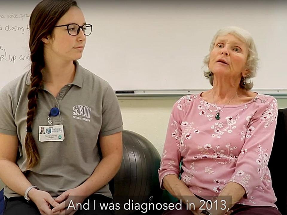 Kaala Cheney, DPT '20, and Michelle Johnson (from left) explain the physical therapy program's hands-on labs for people with Parkinson's disease.