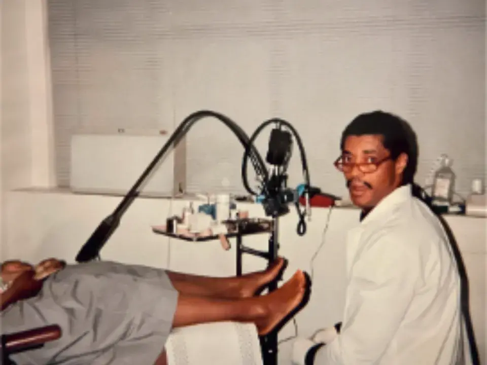 Dr. Lewis examines a patient