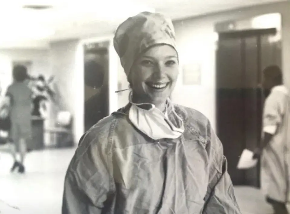 Rondi Crowley wearing scrubs in hospital